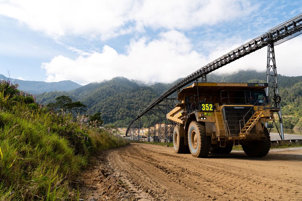 The overland conveyor minimises the use of heavy haul trucks on the road between the pit and processing plant.