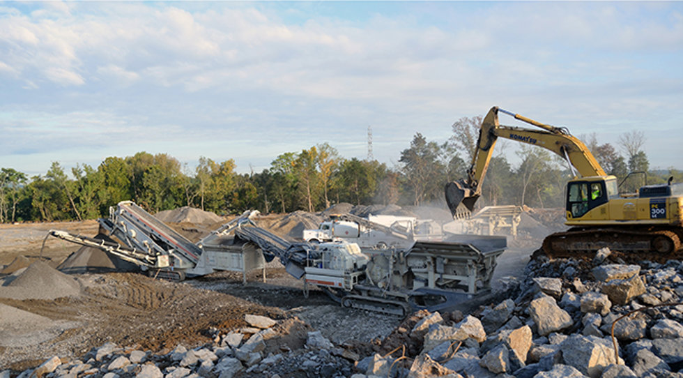 Lokotrack LT1213 and ST3.8 chain at a site.