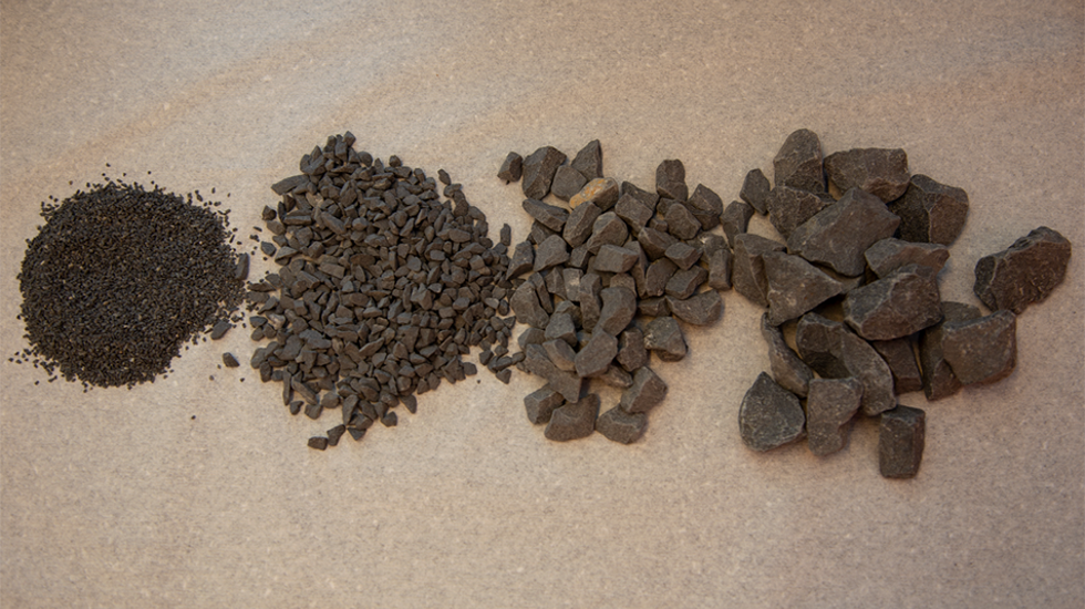 Four piles of example grain sizes.