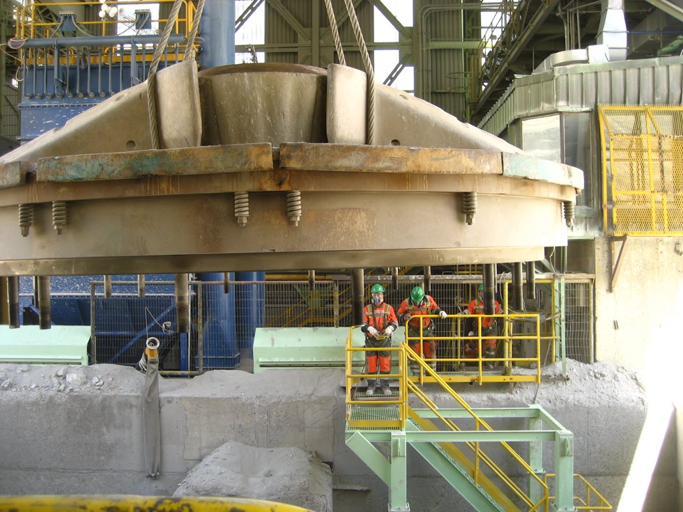 Primary gyratory crusher part being lowered.