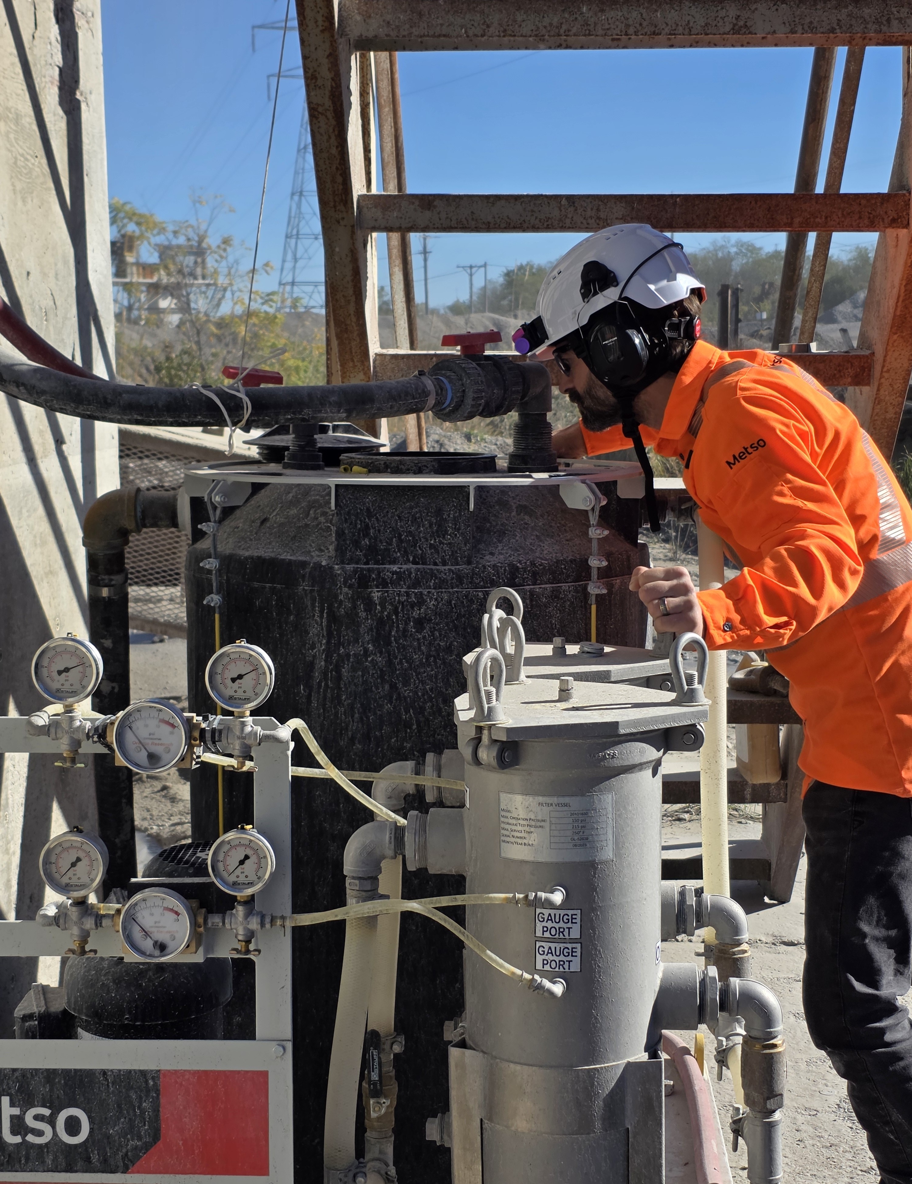 Engineer installing a crusher.