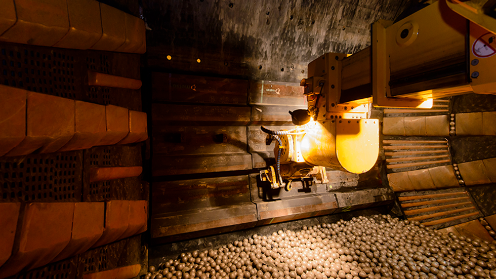 Megaliners being installed with a machine inside the mill.