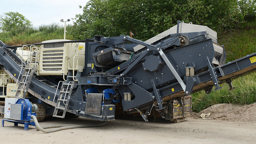 Lokotrack® LT1213S™ in front of forest. 
