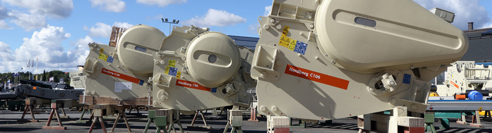 Three Metso Nordberg C-series jaw crushers in line at the factory yard.