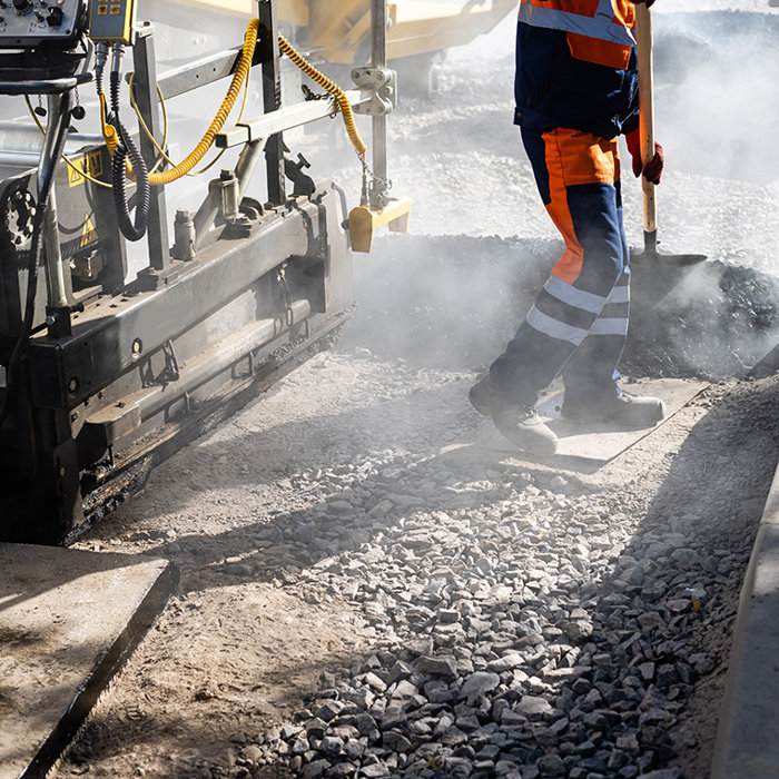 Processed RAP being added to an asphalt production plant 