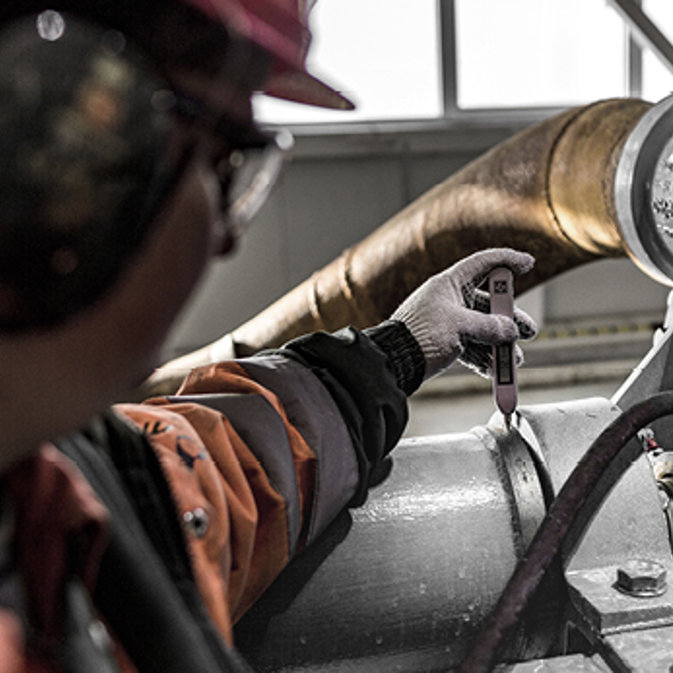 Expert working with pumps