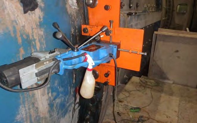 Removing broken bolts from mills with drilling equipment