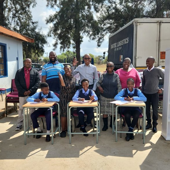 Donating desks and chairs to Segakwane Primary School